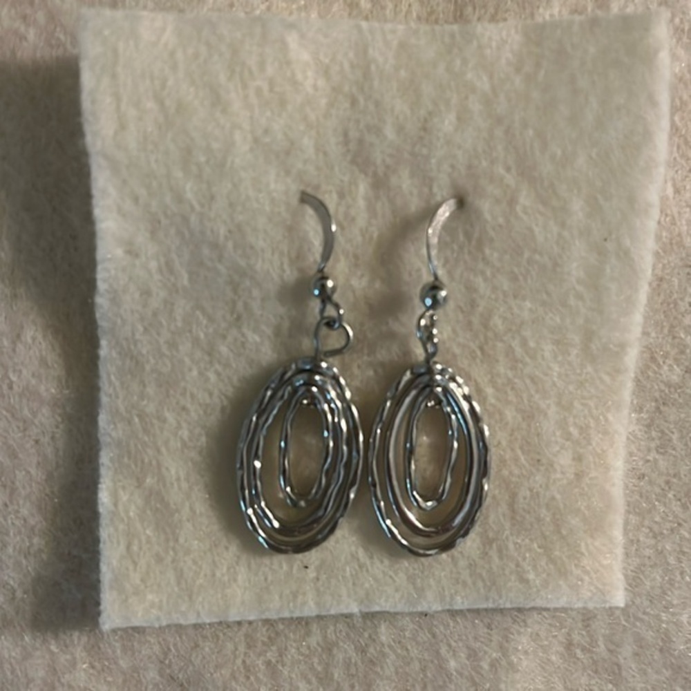 Silver tone, dangling earrings, 1-1/2” long, NWOT.